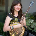 Amelia Hawke Tebalt '26 with her tenor banjo